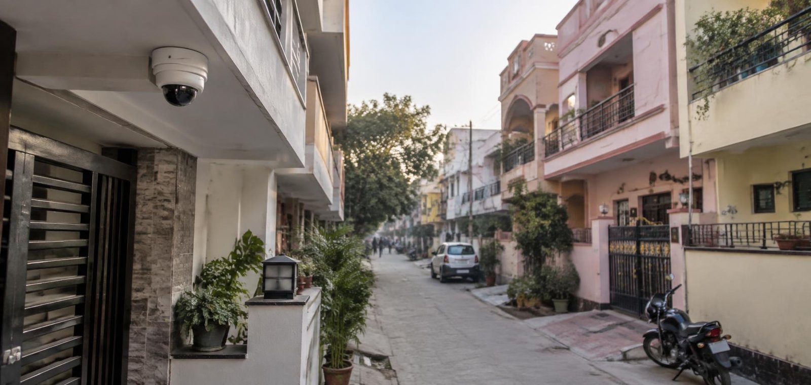 Residential street in Darbhanga with a CCTV camera mounted under a balcony